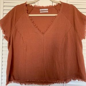 UO Burnt orange flowy top w/ distressed detailing